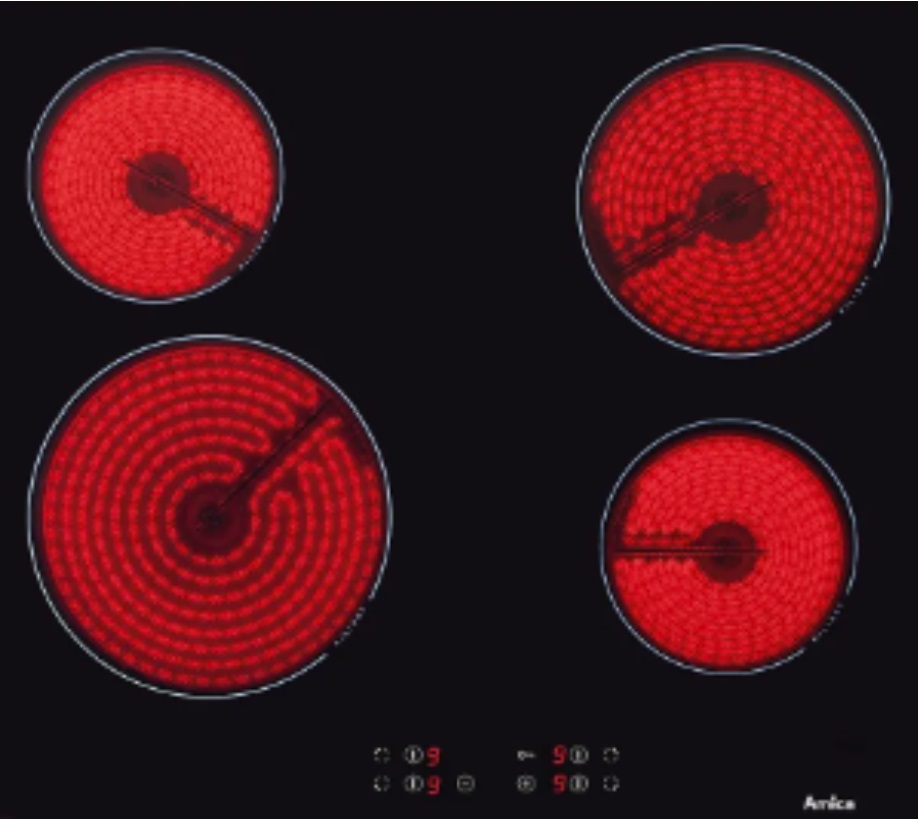 Amica ACH6420FR hob with all rings glowing hot.